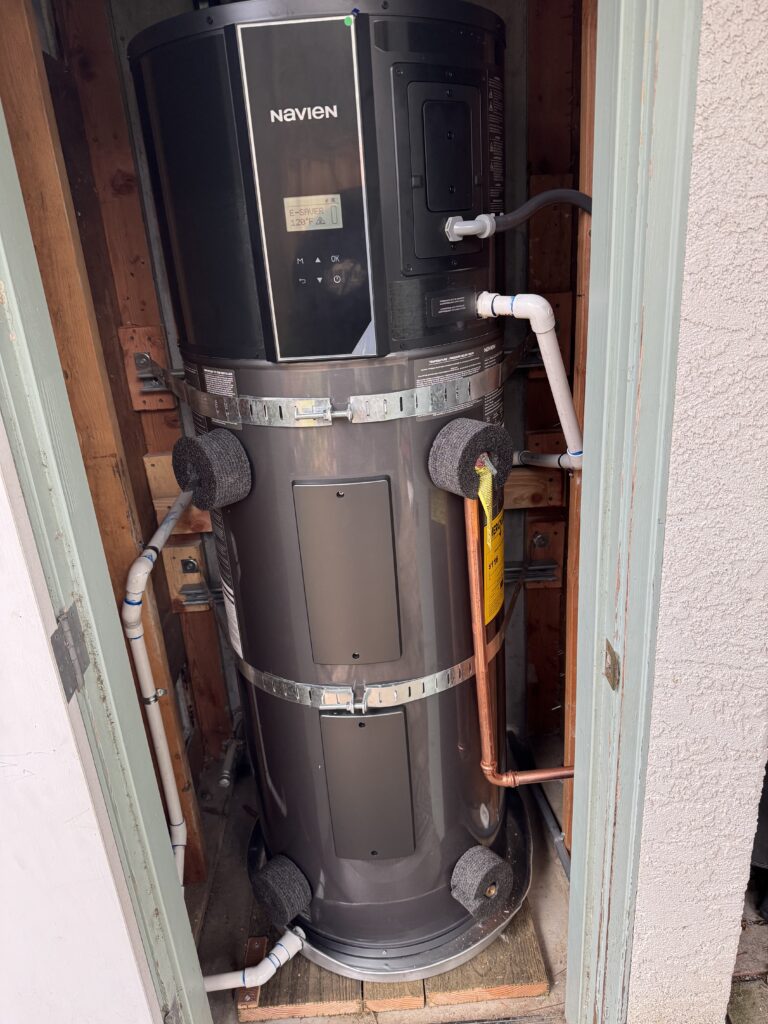 Open HVAC air handler showing internal components and wiring
