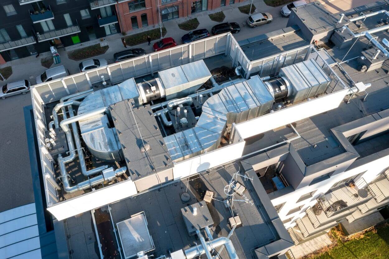 Commercial HVAC system with exposed ductwork in an industrial space